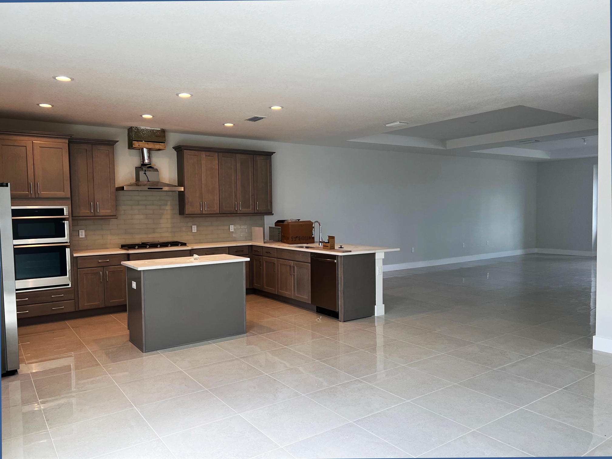 Pigeon Plum Townhome Island, Hood and Breakfast Bar. Tray Ceiling in Dining and Living Room